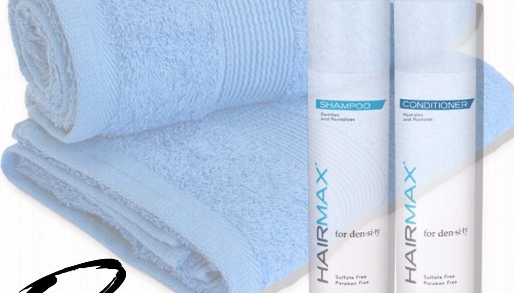 Soft blue towels with matching skincare products beside them.